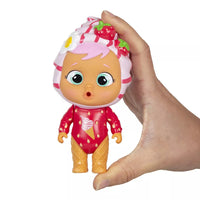 hand holding icy world doll 