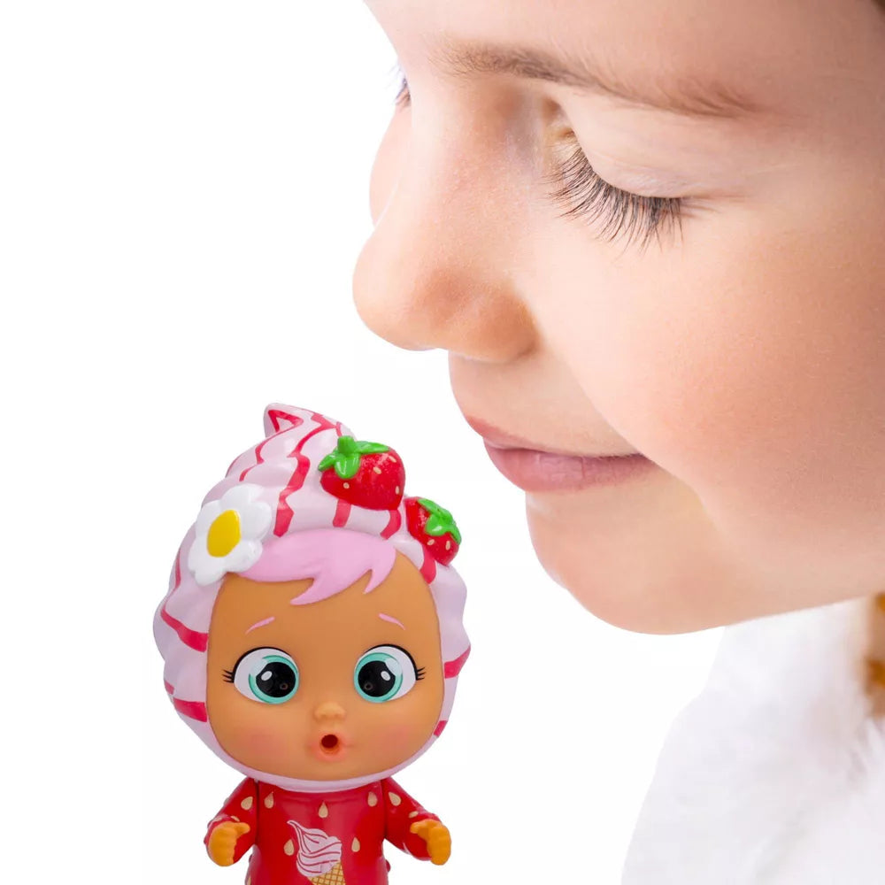 girl smelling icy world doll 