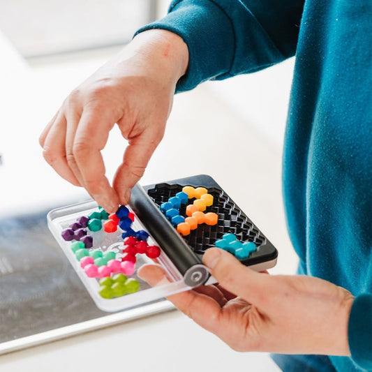 person playing iq six pro game 