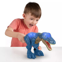 boy playing with blue dinosaur 
