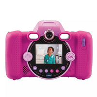 Bright pink kids camera on white background 