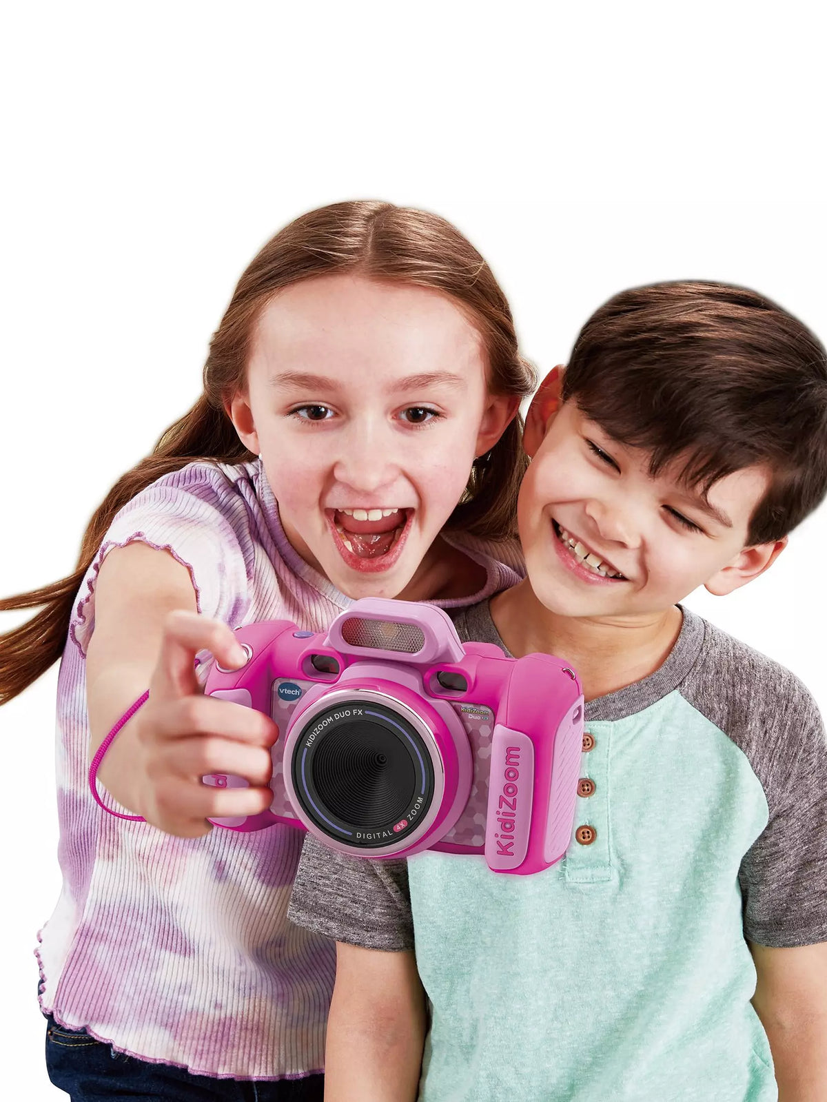 two young kids holding out bright pink kids camera on white background