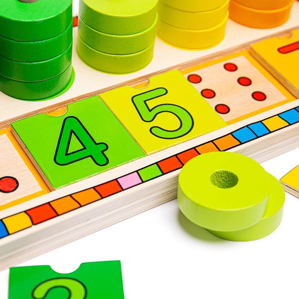 close up green squares on wooden counting toy 