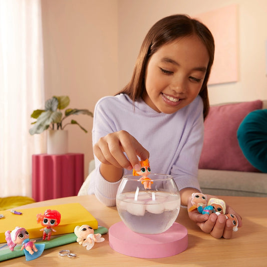 child playing with colour changing baby dolls 