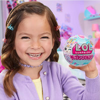 girl holding lol unicorn surprise ball 