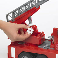 hand playing with wheel on fire engine 