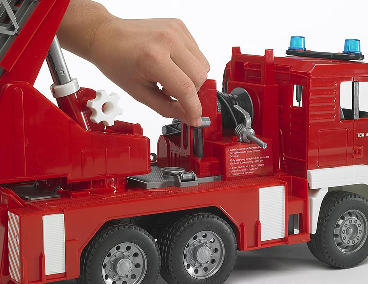 close up of hand playing with fire engine 