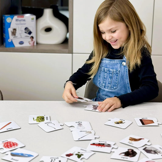 girl playing with match it rhyming 