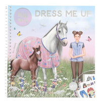 front cover of miss melody dress me up 