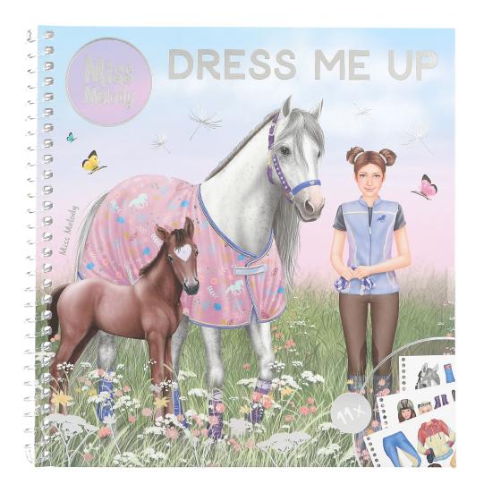 front cover of miss melody dress me up 