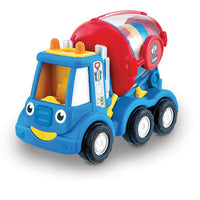 front view of a colourful toy cement mixer on a white background