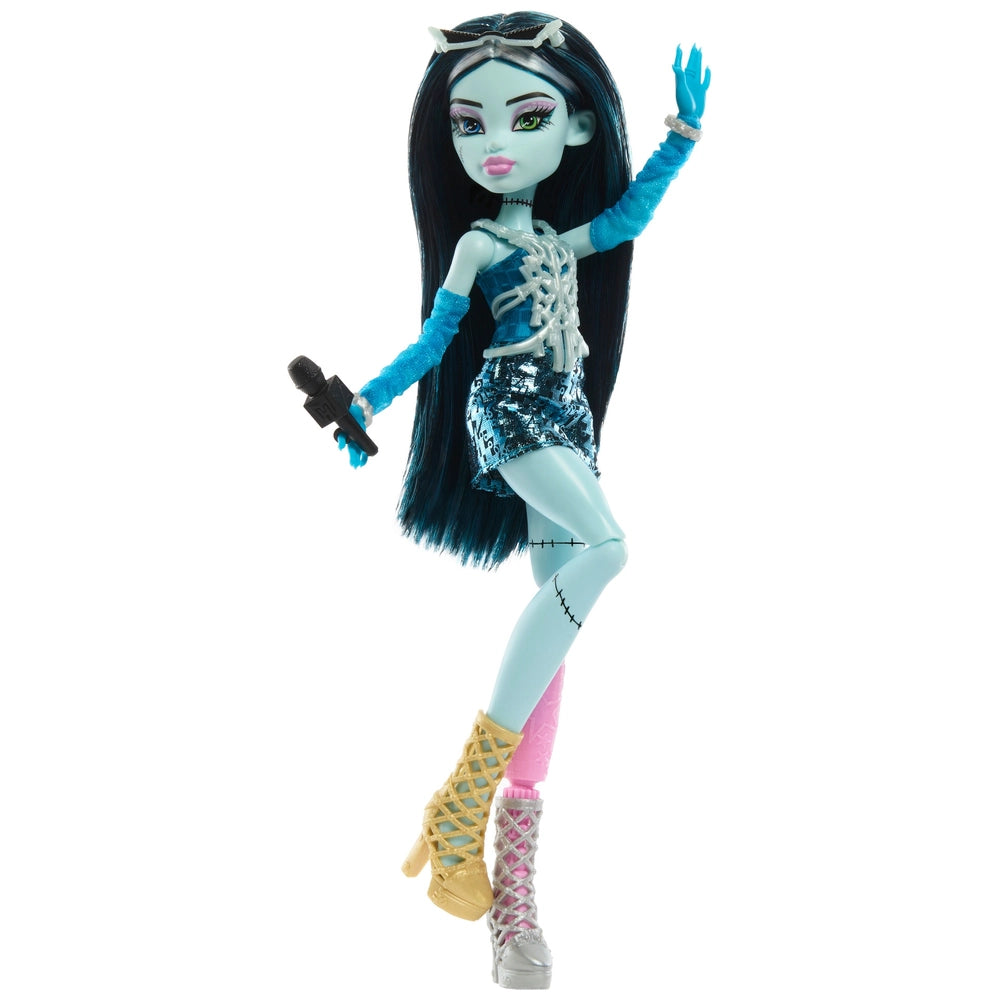 blue fashion doll with microphone in hand 