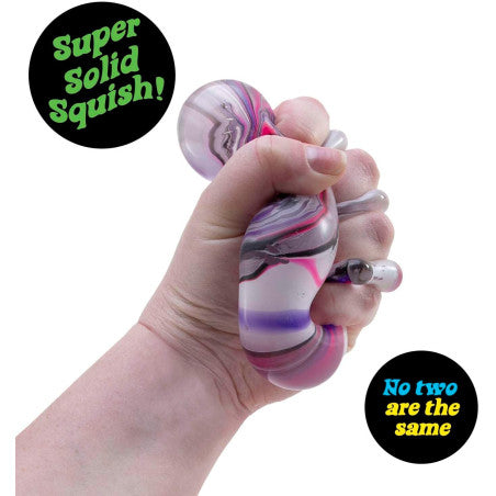 hand squishing purple fidget cube 