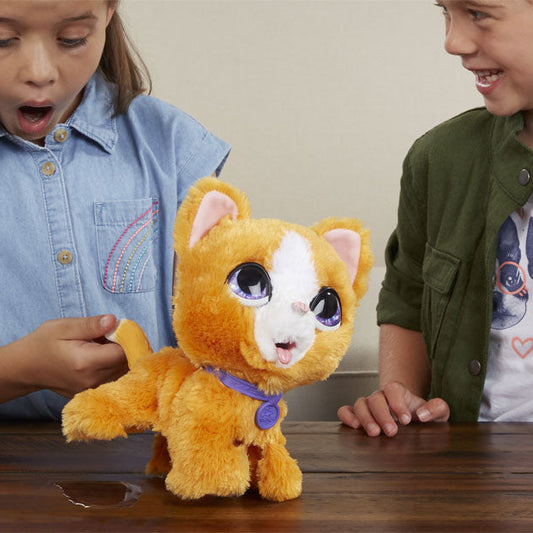 children playing with peeing cat toy 