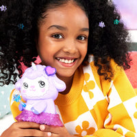 purple lamb compact with accessories inside and girl smiling 