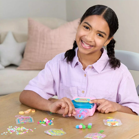 girl playing with puffy pouches candy set 