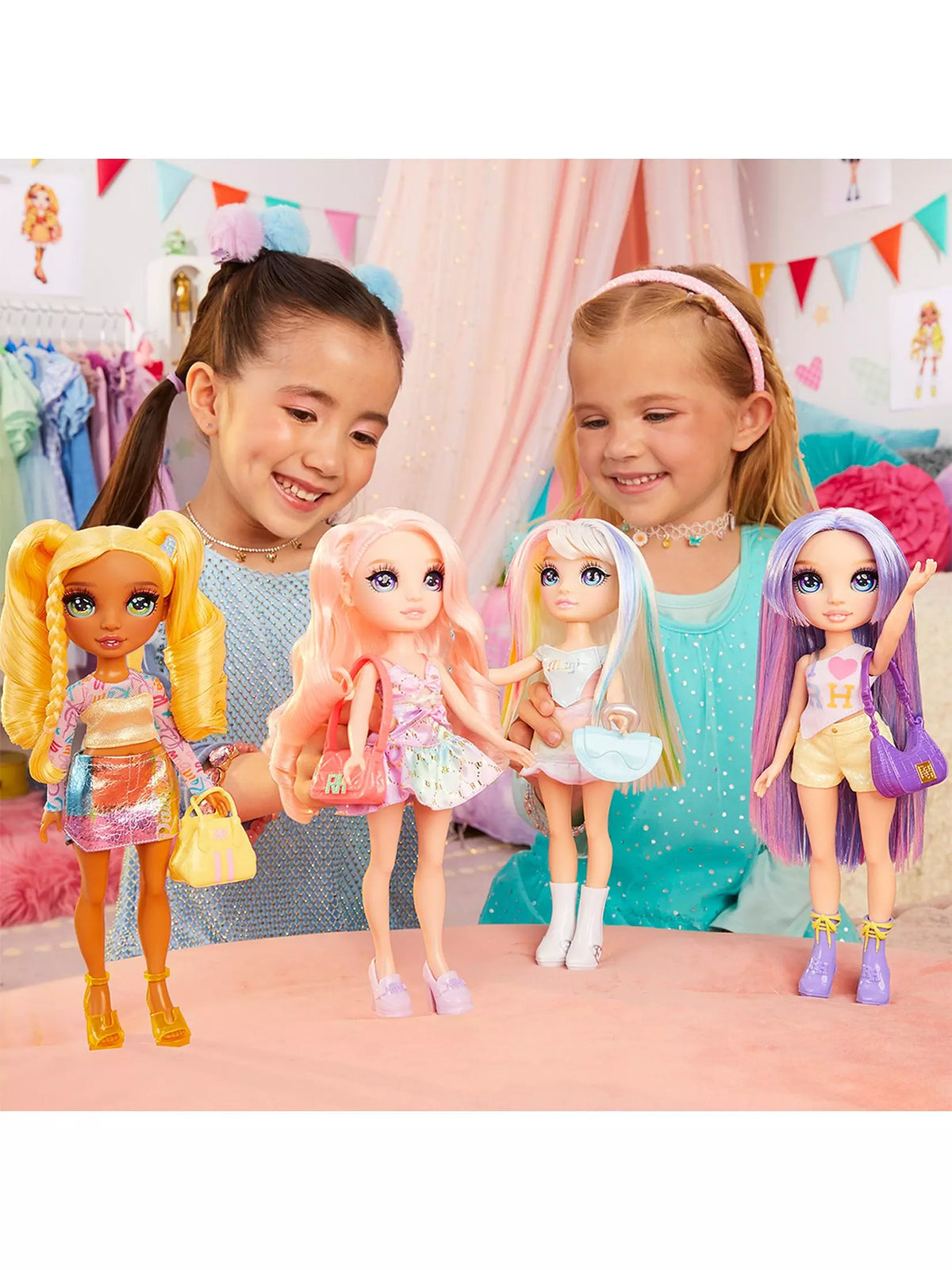 two girls playing with dolls 