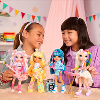 two girls playing with rainbow high jr dolls 