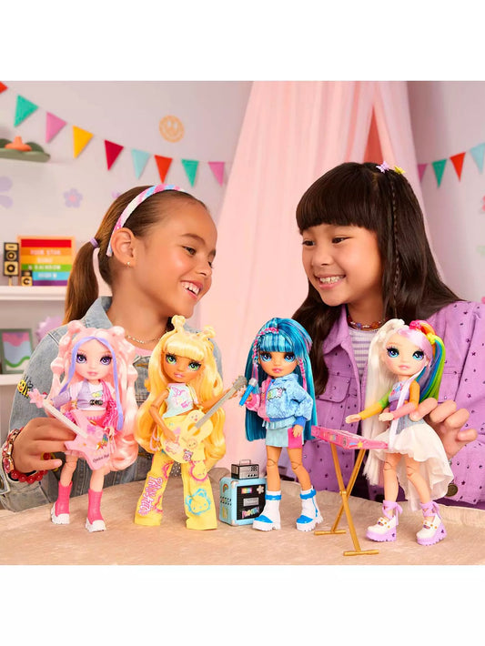 two girls playing with rainbow high jr dolls 