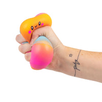 hand squishing marshmallow squishy toy 