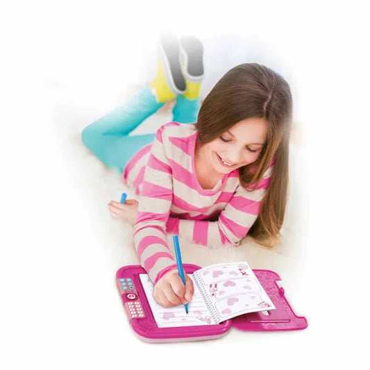 girl writing in vtech magic diary 