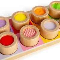 close up of wooden sensory board 