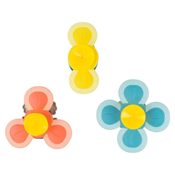 the back of three sensory spinners on white background 