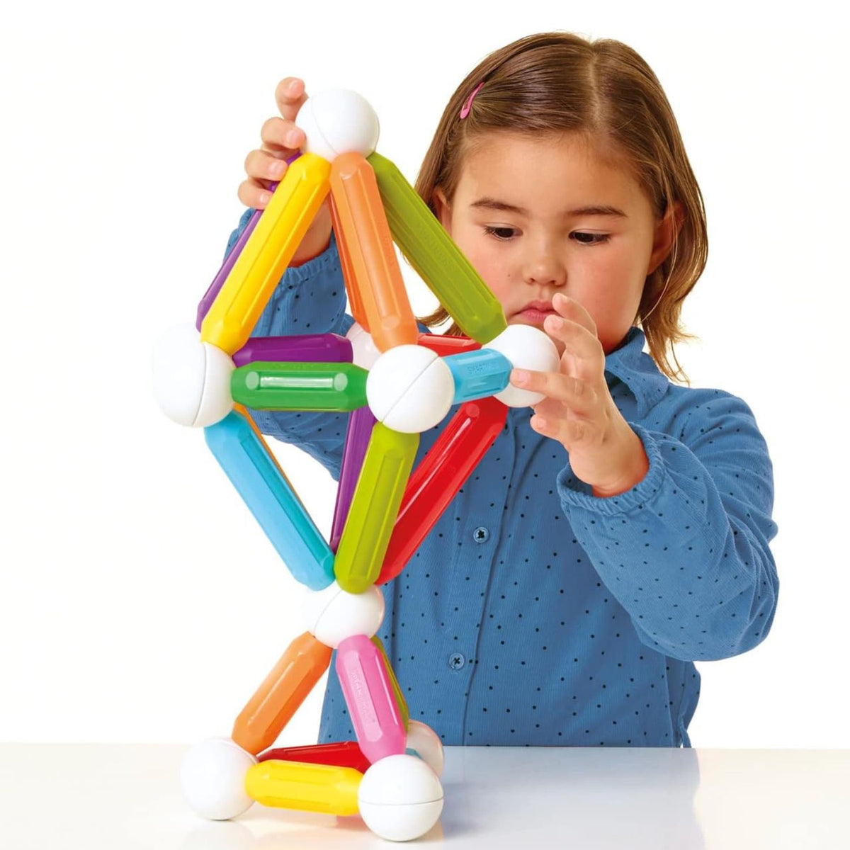 girl playin with smartmax xl pieces 