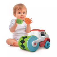 toddler playing with soft blocks of sensory road roller 