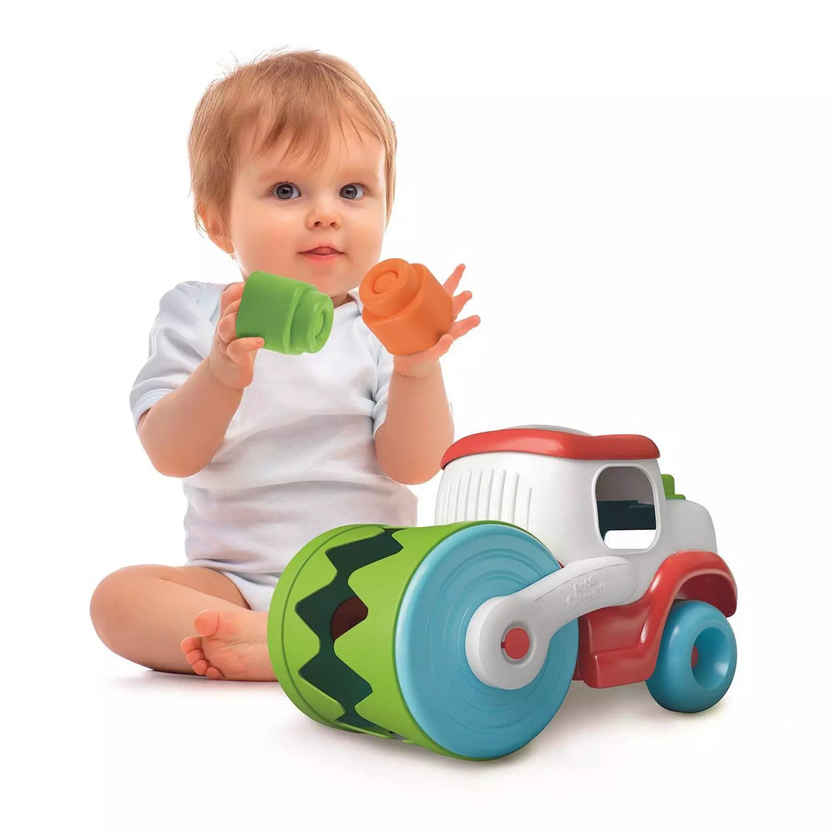 toddler playing with soft blocks of sensory road roller 