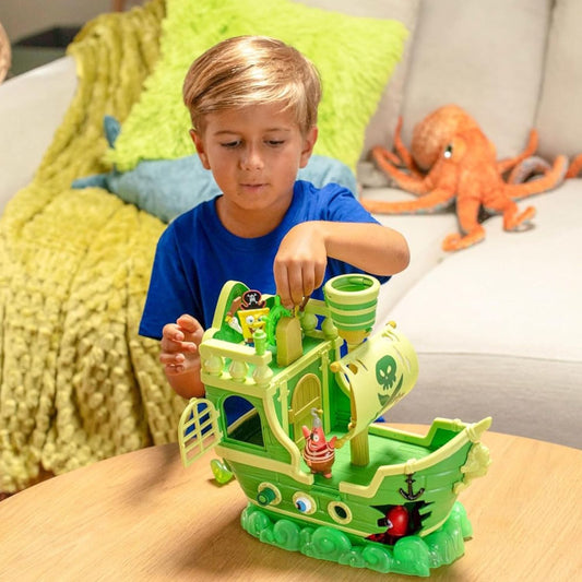 child playing with spongebob playset