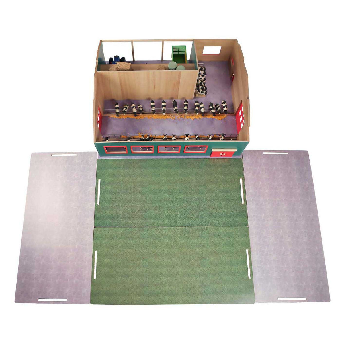 barn from above with cow inside and fake grass 