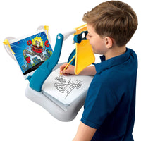 boy drawing with supergraph drawing kit 