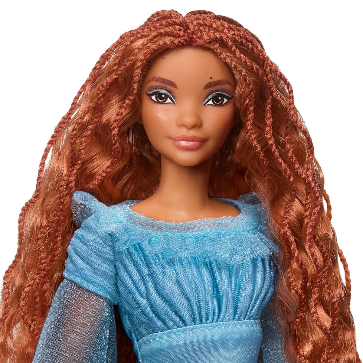 face of the little mermiad doll 