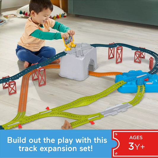 child playing with Connect & Build Track Bucket Set