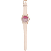 pink strap watch laid flat 