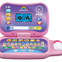 pink and purple toy laptop on white background 