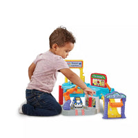 toddler playing wit colourful driver repair playset 