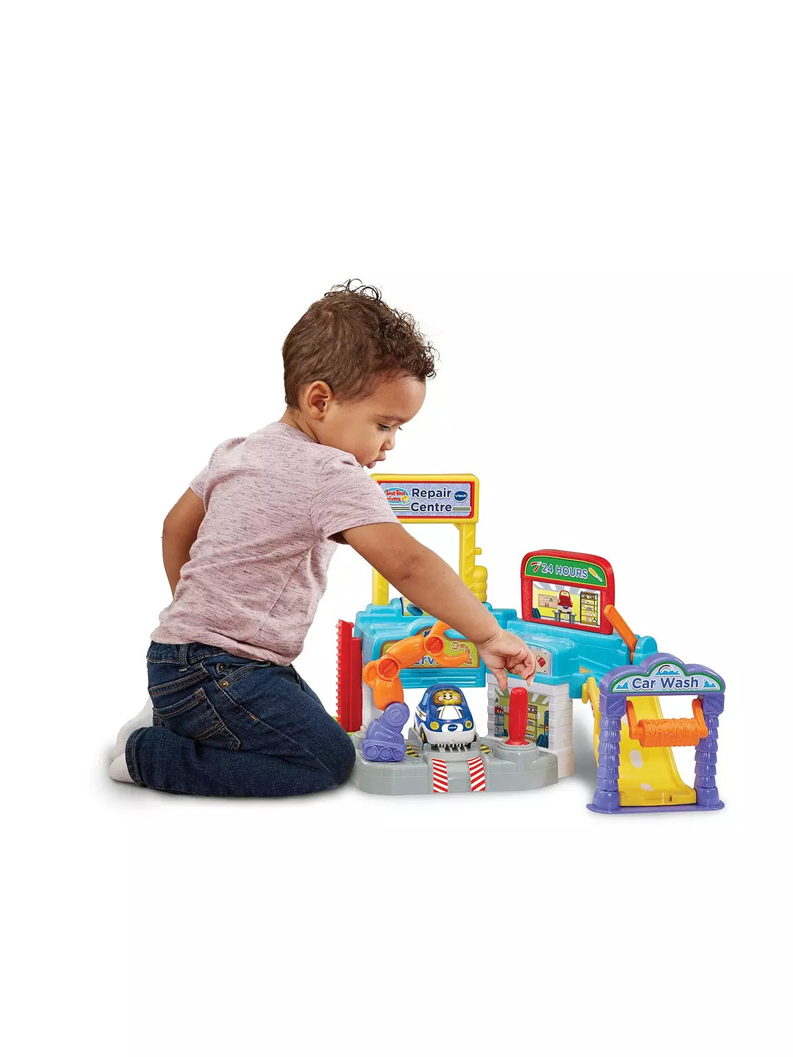 toddler playing wit colourful driver repair playset 