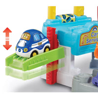 car in colourful toy driver repair site on white background 