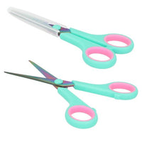 open and closed scissors lying flat 