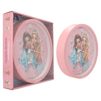 wall clock displayed with packaging 