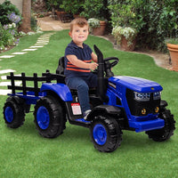 young boy on blue ride-on electric tractor toy outside
