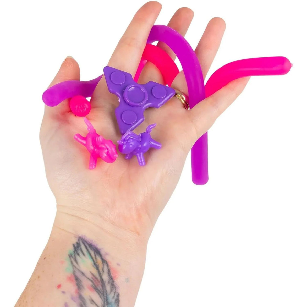 hand holding unicorn sensory slime kit 