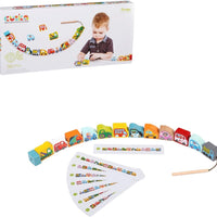 contents of wooden lacing toy on white background 