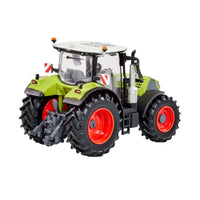 Rear three-quarter view of the Britain's CLAAS Arion 6.190 toy tractor featuring detailed rear linkage, enclosed cab, and realistic agricultural tyres on a white background.