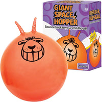 Orange space hopper with face design next to its packaging box on a white background