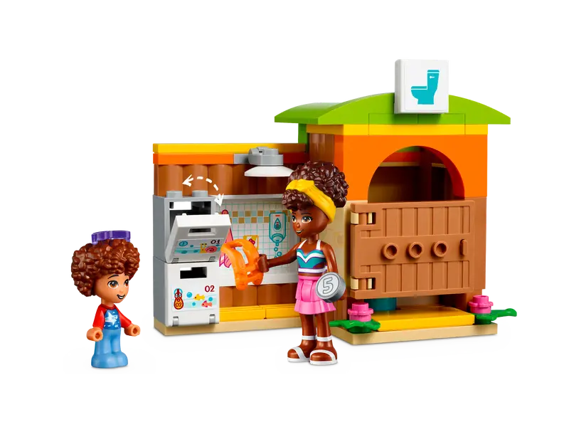 Kids enjoying LEGO Friends 41720 Water Park playset with octopus and changing area