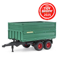 Green toy trailer with red wheels and 'WELGER' branding, featuring an RTE Toy Show 2025 badge.