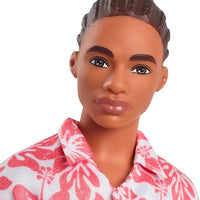 Styled with a molded braided brown hairstyle